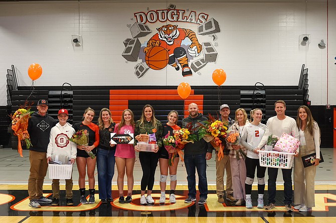 Douglas High School volleyball celebrated Senior Night this past Thursday in its win over Spanish Springs. The Tigers honored their three seniors, pictured from left to right alongside their families, in Ella Girdner, Parker Estes and Sumer Williams.