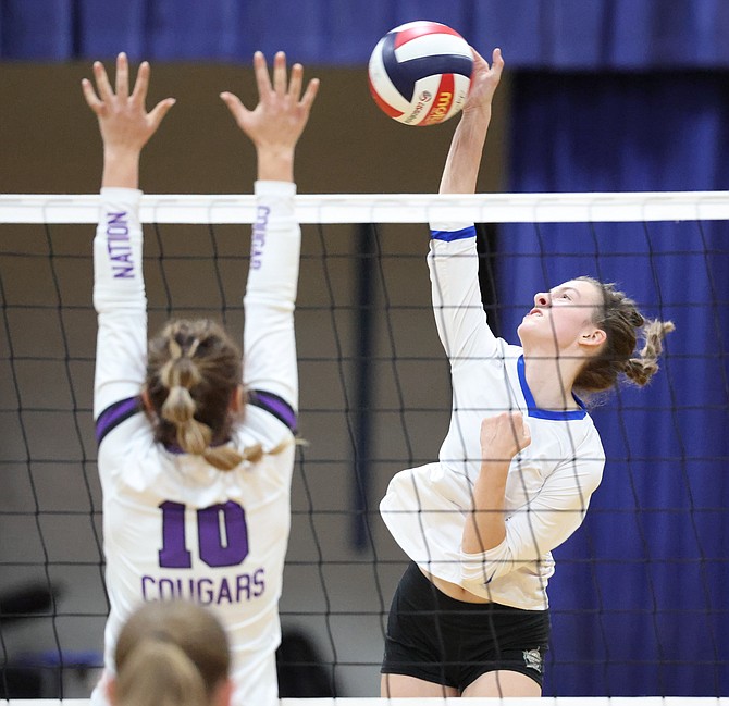 Carson High’s Emma Sanders lines up a kill earlier this season against Spanish Springs.