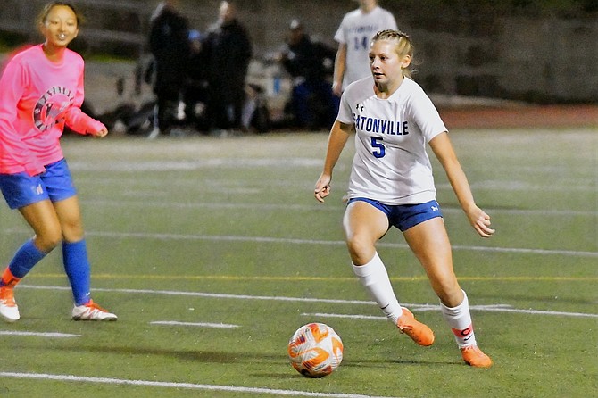 Eatonville's Mary Van Eaton dribbles the ball upfield in the Cruisers match against Washington. Van Eaton would score twice in the game to help her team come out on top, 5-0.