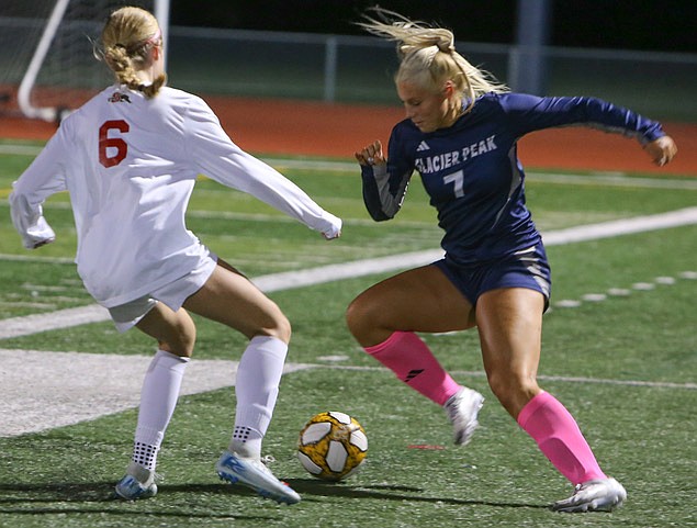 Glacier Peak Grizzly senior defender Samantha Zylstra and Snohomish Panther  sophomore Emmery Fedewa square off near the side line in first half play of a cross-town match up Tuesday, Oct. 14 at Glacier Peak’s field.
The Snohomish side scratched out a 2-0 win. Panther senior Mia Otttow scored in the first half and teammate Nevaeh Howerton added the final goal in the second.  
It was a non-conference game.
Snohomish HS, in Wesco 3A, is undefeated in its league and had a record of 10-2-0 (8-0-0 league) as of Friday, Oct. 18.
Glacier Peak, in Wesco 4A, had a record of 6-4-1 (5-3-1 league) as of Friday, Oct. 18.