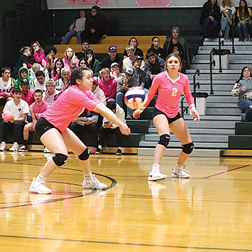 Battle Mountain’s Alexis Rangel passes to a teammate after receiving a Pershing County serve during Friday’s match in Battle Mountain.