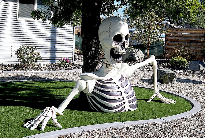 Two neighbors along Tillman Lane in the Gardnerville Ranchos are having a competition to see who can have the biggest and most Halloween decorations in their yards.