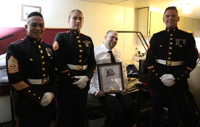 Nicholas Campbell, 25, was awarded a title of Honorary Marine by the U.S. Marine Corps Wednesday by Sacramento Maintenance Services Co.’s 1st Sgt. Xuchill Lupit, SSgt. Madeline Gifford and Cpl. Joshua Windham.