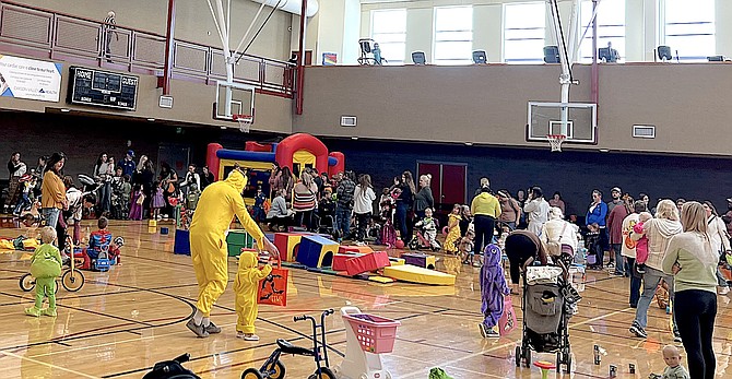 It was Halloween Toddler Time at the Douglas County Community & Senior Center on Thursday where costumed children went from room to room electioning for candy as voters lined up to cast a ballot.