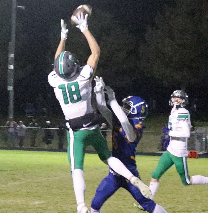 Fallon’s Wyatt Peek hauls in a pass against Lowry on Friday.