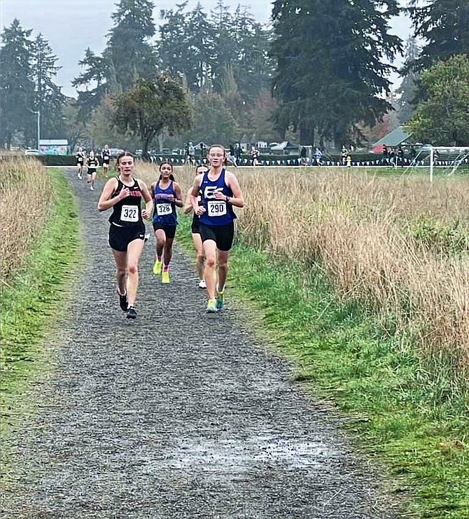 Eatonville's Grace Coonrod leads the pack of runners as she went on to win the race and claim the 2A SPSL league title.