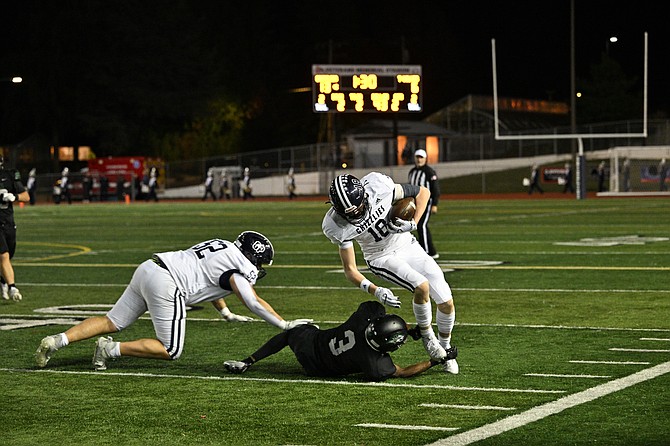 Glacier Peak wide receiver sophomore Zachary Albright works to dodge Jackson running back junior Tre Austin during the Wesco 4A matchup Friday, Oct. 25 on Glacier Peak’s field. Glacier Peak won 41-14 while never ceding the lead, and after the second quarter, Glacier Peak leaped ahead against the closely-matched Timberwolves.
The Grizzlies stand 4-1 league, 7-1 overall. Jackson’s at 3-3 league, 5-3 overall. Glacier Peak plays Kamiak this week at Goddard Stadium. Jackson hosts the Lynnwood Royals at home this week.