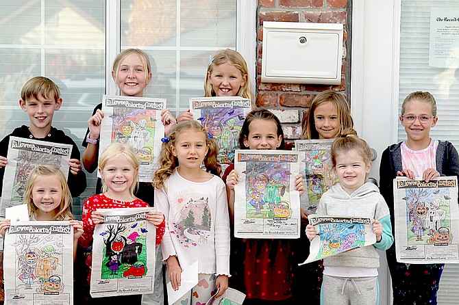 Record-Courier coloring contest winners: (Back row) Kellan Sheridan, Avery Dilley, Lauren Jacobsen, and Annistyn Johnson. (Bottom) Quinn Sheridan, Nixon Baugh, Sydney Hackler, Natalie Drew, Alie Nelson, and Tatum Hackler.