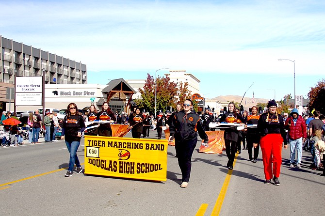 The Douglas High School Marching Band performs in Saturday's Nevada Day Parade. Nevada's actual 160th birthday is Thursday.