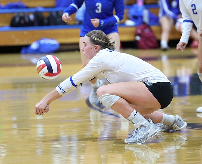 Carson High’s Abby Franco lunges for a dig during a home match this season. Franco’s ability to scoop digs from the back row is a big reason why the junior hitter almost never leaves the floor.