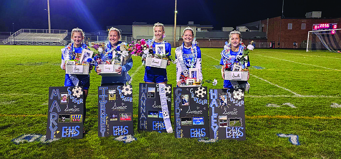 Eatonville seniors Mary Van Eaton, Tierney Amaral, Hannah Hanson, Caedee Dunn, and Haley Courson all posed for a photo during Senior Night festivities.