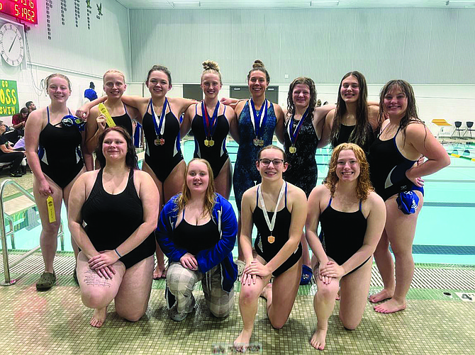 The Eatonville Cruiser swim team poses for a quick photo after competing at the District Championships. Back: Lily Hays, Charlotte Stumph, Nicole Tomyn, Gracie Forsman, Kaylee Bernt, Annika Howard, Jaliah Vinson, Bella Wolters. Front: Shyla Brown, Morgan Wendell, Jane Morrish, Sami Hann.