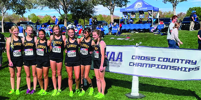 The Lowry High School girls cross country team finished fourth at the NIAA 3A State Championships held this past Saturday at Veterans Park in Boulder City,