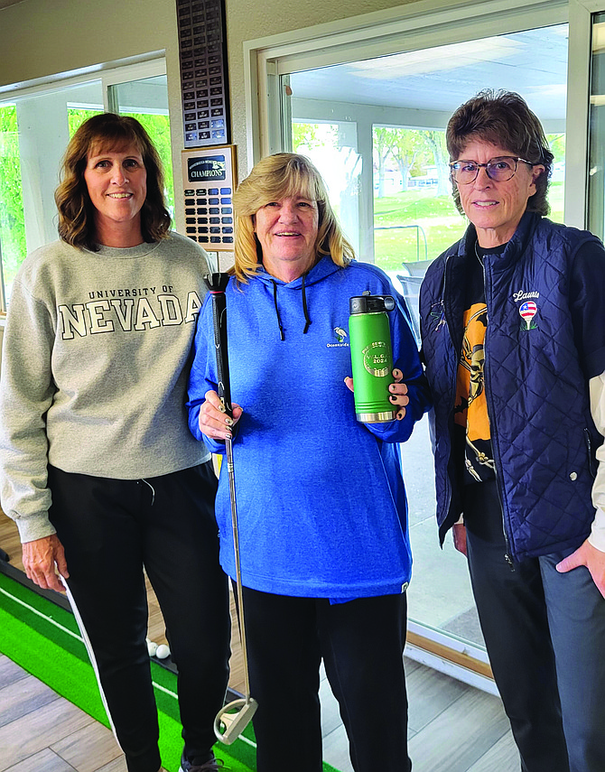 Left to right are co-president Lisa Carlson, Pam Hope (the winner of the President’s Cup) and co-president Laurie Pickett.