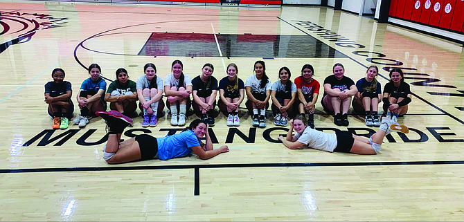 The PCHS volleyball team poses for a photo after their last practice before the regionals. Left to right back row - Kenya Vaughan, Emma Blondheim, Magdalena Ramirez, Kyra Cerini, Alexa Watson, Khloe Montes, Mia Canchola, Laura Gomez, Jaymie George, Katelynn Elerick, Whitlee Diaz and Chealse Woodard. Front row - Aaliyah Allen and Arya Garland