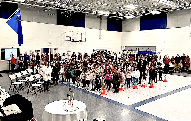 Gardnerville Elementary School students at their annual Veterans Day Assembly on Wednesday morning that was attended by about 30 former and current service members. In the foreground is the Missing Man Table.