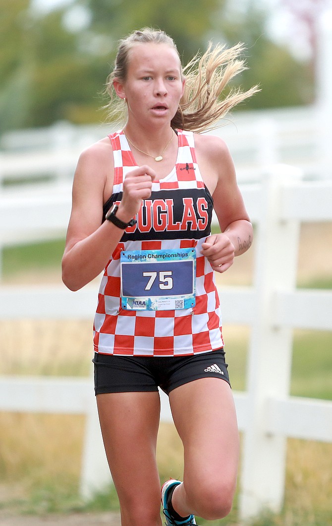 Douglas High’s Lucy Nord hits the back straight during the Class 5A North girls cross country meet at Rancho San Rafael Park. Nord was a first-team all-region selection.