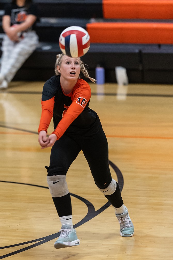 Douglas High’s Sumer Williams lunges to make a play this season for the Tiger volleyball team. Williams was named a first-team all-region player in Class 5A.