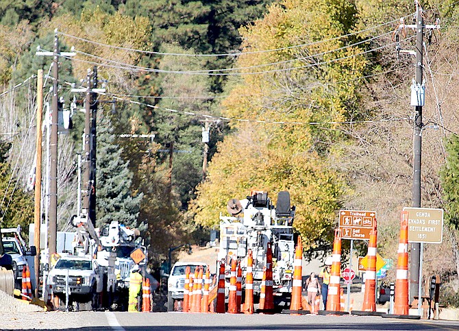 NV Energy workers in Genoa on Friday morning. A public safety outage watch is in effect in Nevada's oldest town starting 11 a.m. Monday.