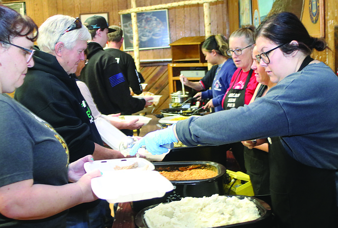 Volunteers prepare Thanksgiving meals in 2023 to deliver to Churchill County’s seniors.