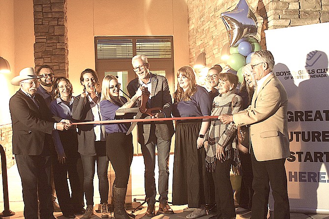 Boys and Girls Clubs of Western Nevada CEO Brett Zunino, staff and the Carson Valley Chamber of Commerce cut the ribbon during the grand opening of the Wray Family Clubhouse in Minden on Nov. 8.