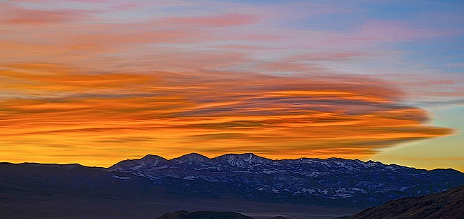 A red dawn over the Sweetwaters this morning in this photo taken by Topaz Ranch Estates resident John Flaherty.