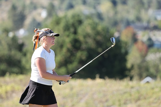 Kailynn Dollar steps up to a tee shot at the Class 4A girls golf state tournament at Genoa Lakes. Dollar earned an honorable mention selection on the all-league team for her play this fall.