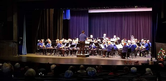 Nick Jacques conducts the Capital City Community Band.