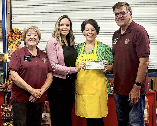 Past Tahoe Douglas Elks Exalted Ruler Anne Marie Neacy, Assistant Principal Veronica Griffith, Nutritional Manager Stacy Chamberlain and current Exalted Ruler Gary Beadle with a $1,000 donation for the Jacks Valley School Nutrition Program.
Elks Photo by Dave Stewart