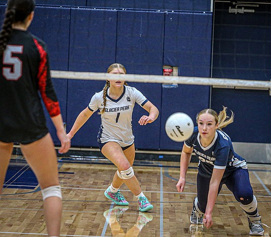 Glacier Peak senior Ava Nowak digs one out of the boards during the fourth-round Districts match Thursday, Nov. 14 against Mount Si. The Glacier Peak Grizzlies had a 
3-0 win. The games were essentially tied the entire way. The largest margin of lead was displayed in the final score of each game, 25 - 20, 25 -23 and 25 - 22. In each game the lead swung, back and forth on long volleys and smashing service aces.
After  #5-ranked Glacier Peak took a 1-3 loss to #4-ranked Issaquah in the second round, they persevered through two loser-out games on their path to State, winning third round against Woodinville 3-0 Tuesday, Nov. 12, then this game to knock out Mount Si to seal their ticket to State. They followed on to win 3-1 over Arlington Saturday, Nov. 16 for the final round. Lake Stevens took the 4A Districts title with a 11-1 league record over Glacier Peak’s 10-2. For State, seeding was not complete yet. Glacier Peak, Lake Stevens and Arlington made it to State among Snohomish County 4A teams.