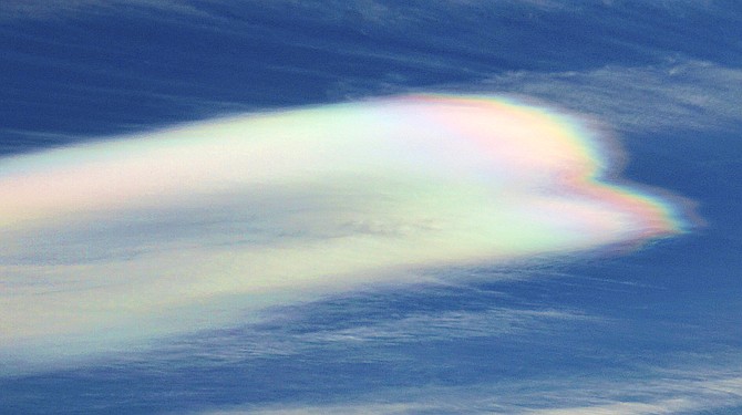 Wind-blasted clouds show iridescence as the sun passes through ice crystals over Topaz Ranch Estates on Wednesday. 
Photo special to The R-C by John Flaherty