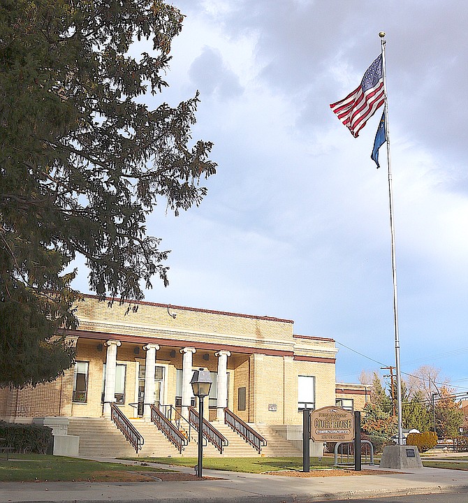 Flags fly in the wind in Minden on Friday morning.