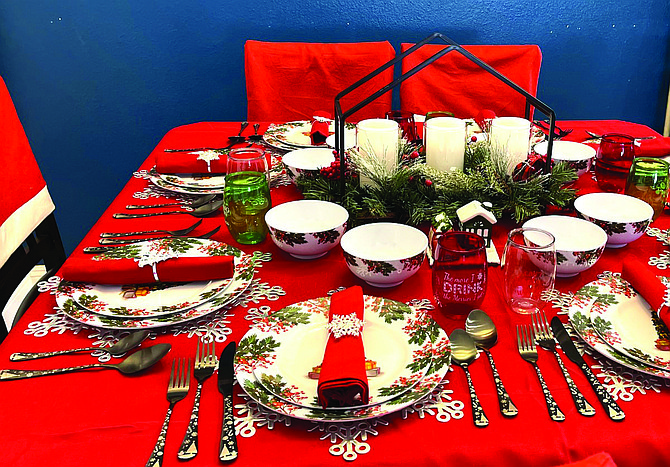 The Mathern home dining room table is decorated for a Christmas meal ahead of the Grad Nite 2025 Christmas Home Tour.