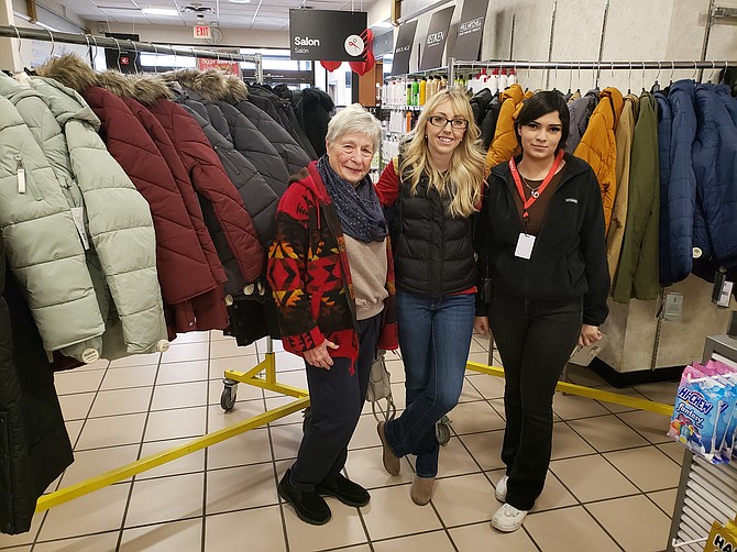 From left: Cecilia Larson, of the St. Vincent de Paul Society and co-chair Hugs for Homeless program, and Jennifer and Alexi from JC Penney.