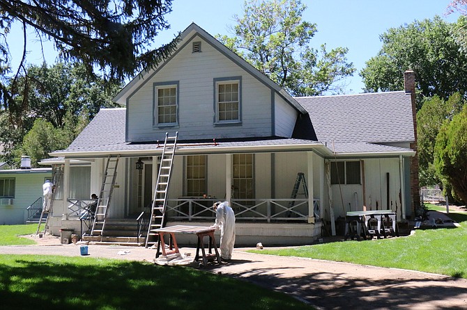 Workers from Carson City painting and decoration company New Millennium LLC work in August to modernize Lisa McFadden’s property at 512 Mountain St. in Carson City, the historic Hannah Clapp house.