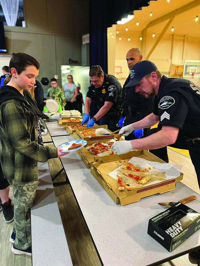 The Pizza Wednesday Club is a popular after-school event that offers all school-aged youth in the Eatonville School District the chance to enjoy a free slice of pizza, a fountain drink, and an opportunity to connect with local community leaders.