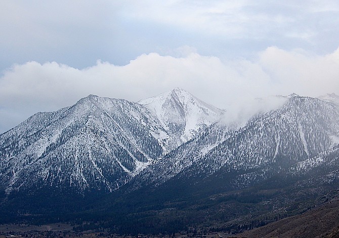 There's a little more snow on Jobs Peak on Tuesday morning after the brunt of a winter storm was limited to the upper altitudes of the Sierra.