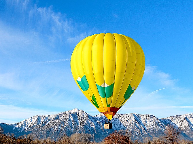 A balloon lifts off on Friday morning south of Gardnerville.