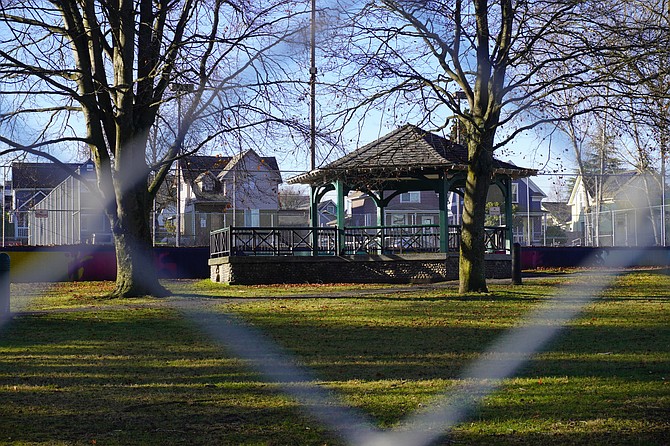 The historic gazebo at Clark Park, to be removed by the city to be replaced with a dog park, stands within the fenced-off park Sunday, Dec. 1.