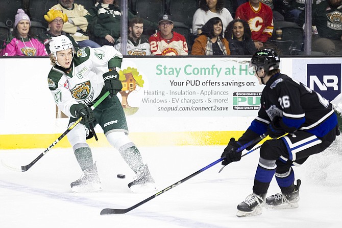 Everett Silvertips defenseman Kaden Hammell passes the hockey puck past Victoria Royals forward Caleb Matthews during Victoria’s 3-2 overtime victory over Everett at Angel of the Winds Arena Nov. 27.
The Tips’ next home games are Friday, Dec. 6 at 7:05 p.m. hosting the Kelowna Rockets and Saturday, Dec. 7 at 6:05 p.m. hosting Seattle. The Everett team was atop the Western Hockey League standings with a 21-3 conference record as of Dec. 1.