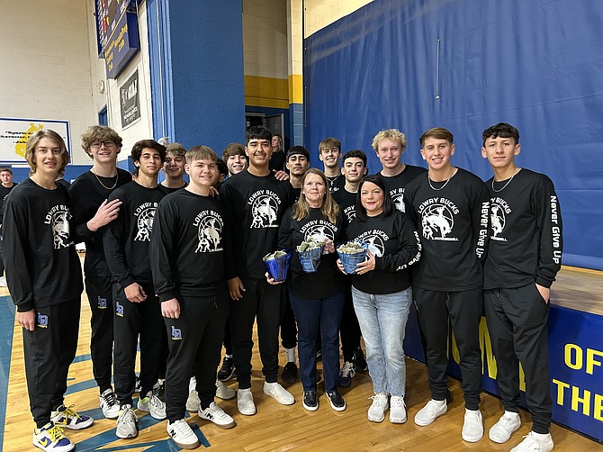 During halftime of the Lowry girls basketball game with Pyramid Lake, the Lowry boys basketball team passed donation buckets through the crowd. In just under two minutes, an additional $1,500 was raised, bringing the total funds raised to over $3,000.