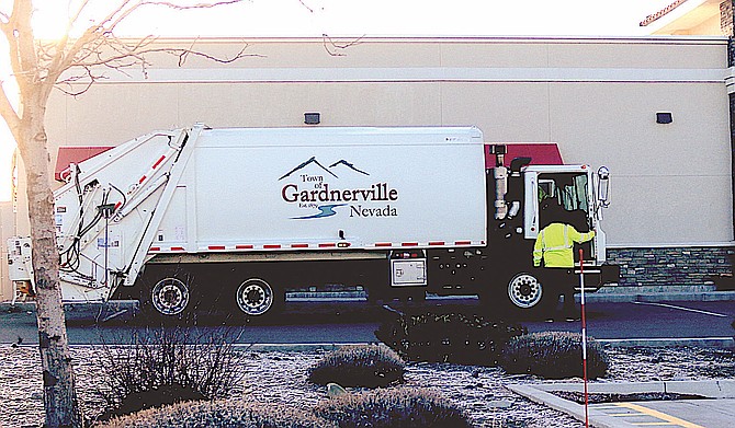 Gardnerville sanitation workers work their route.