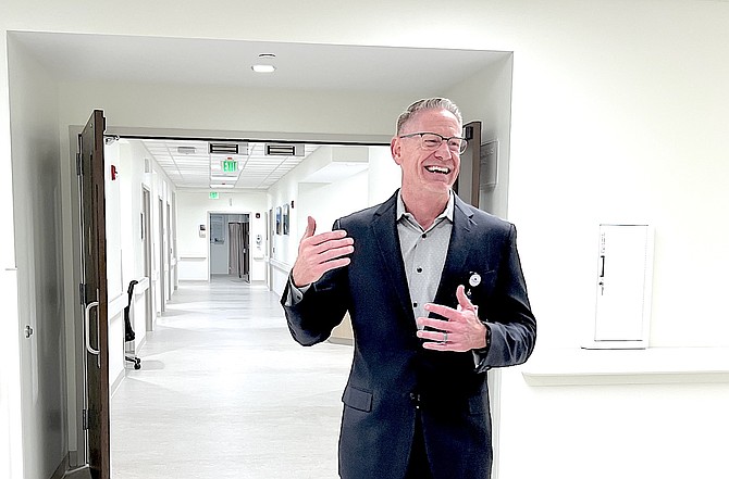 Carson Valley Health CEO Jeff Prater laughs during a tour of the new hospital wing in September.