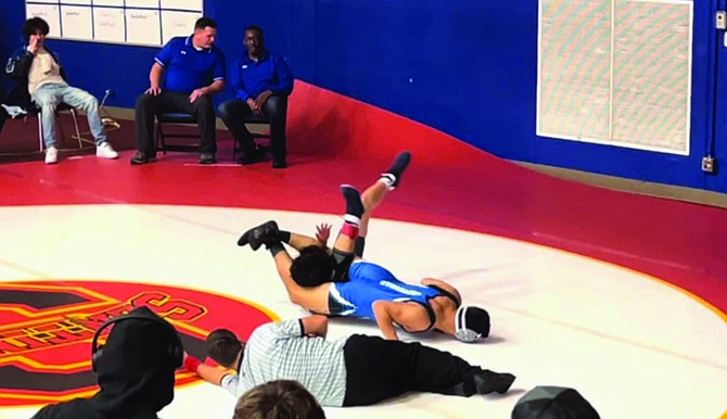 Eatonville's Trey StaRosa puts his opponent in a compromising position in one of his four matches that he won on the day to claim a first-place finish.