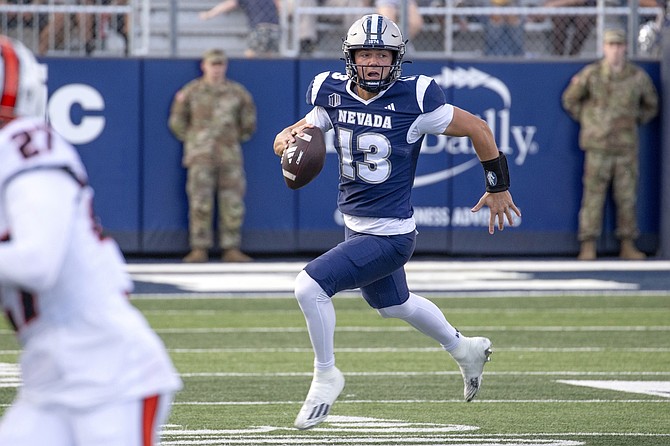 Nevada quarterback Chubba Purdy (13) is getting his money’s worth out of the transfer portal so far this off-season. Currently, he is back on the Wolf Pack roster.