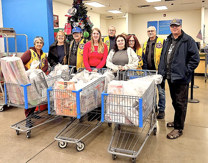Carson Valley Lions shopped for 30 children to donate to Project Santa Claus on Dec. 7.