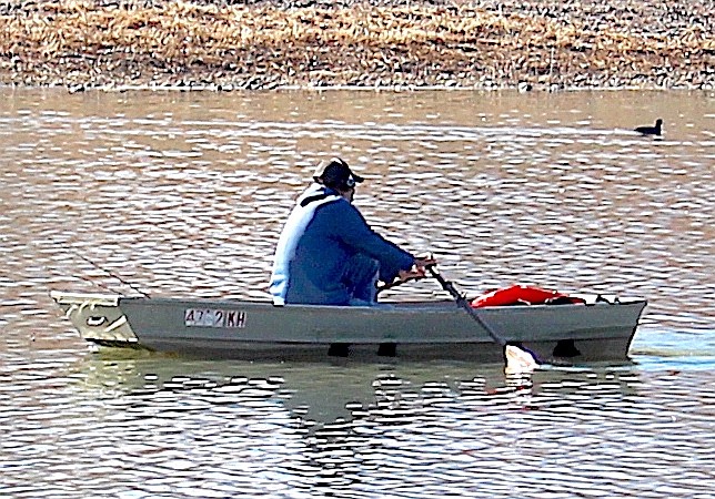 An angler rows across Mountain View Pond in Gardnerville on Nov. 30. The Nevada Department of Wildlife stocks the pond regularly.