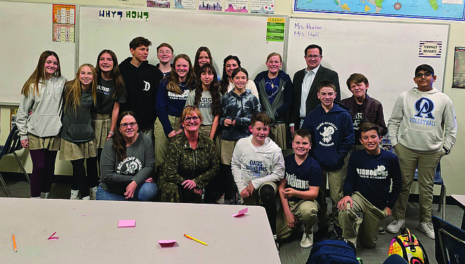 Assemblyman Gregory Koenig poses with students and staff.