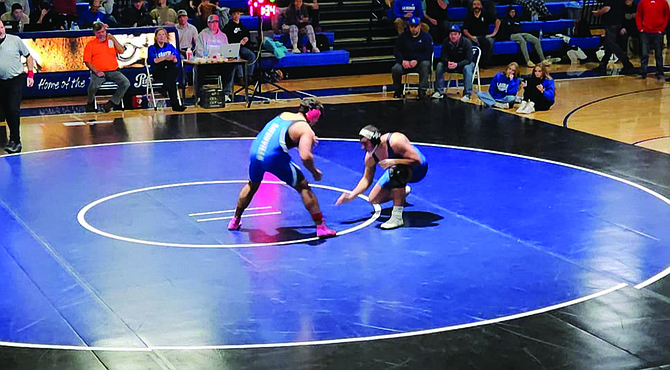 Eatonville's Ethan Rogers (right) squares off against an opponent at the Muilenburg Tournament in La Grande, OR. Rogers would go on to take a 2nd place finish in his weight class.