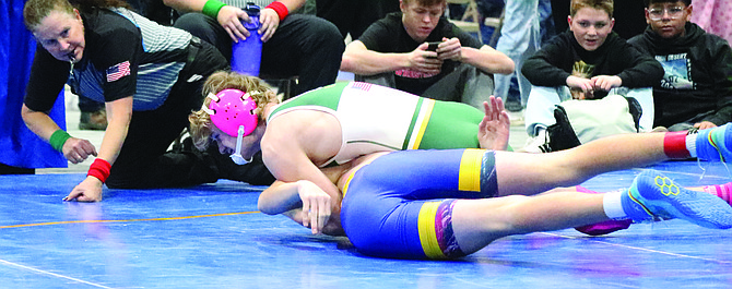 Battle Mountain’s Liam Bundrock turns his opponent to his back at 138 pounds.